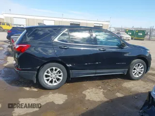 2019 Chevrolet Equinox LT z VIN 3GNAXUEV0KL216360, wystawiony jako IAAI lot #41664268 z przebiegiem 69 411 mil mil oraz . Historia ofert i sprzedaży dostępna na DreamBid. Obrazek 13.