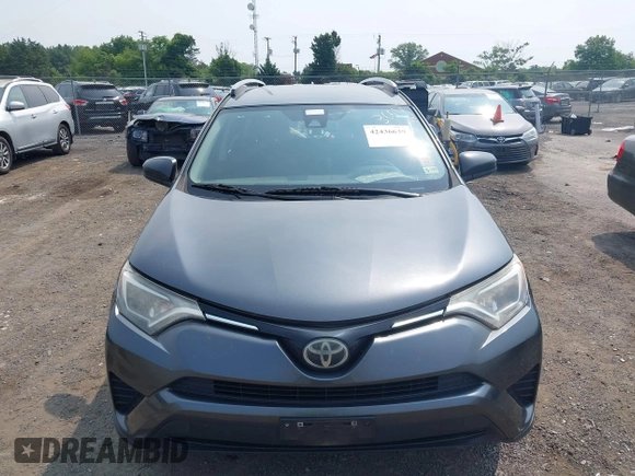 2017 Toyota RAV4 LE with VIN JTMBFREV6HD205665, listed as a IAAI auction lot 42436639 with 217,744 mi miles and . Bid and sale history available at DreamBid. Image 12.