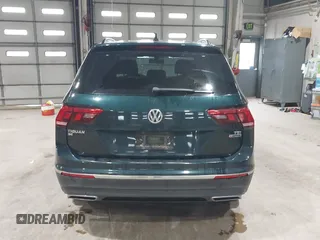 2018 Volkswagen Tiguan SEL with VIN 3VV2B7AX8JM113976, listed as a IAAI auction lot 42310576 with 100,319 mi miles and . Bid and sale history available at DreamBid. Image 16.