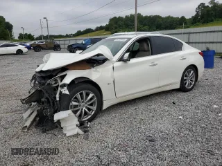 2014 Infiniti Q50 Premium с VIN JN1BV7AP6EM675207, выставлен на аукционе Copart как лот 64205465 с пробегом 150 225 миль миль и Списание • Salvage title. История ставок и продаж доступна на DreamBid. Изображение 1.