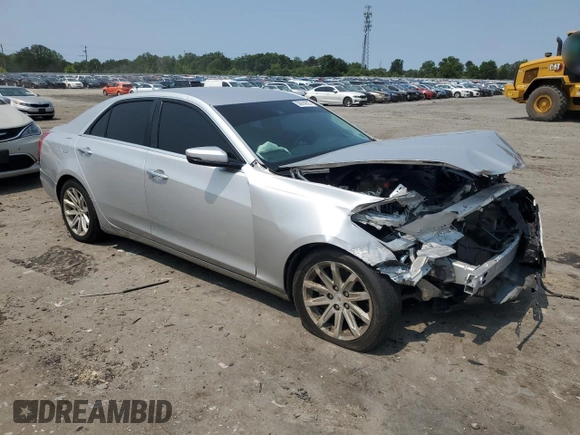 2014 Cadillac CTS Luxury AWD with VIN 1G6AX5SX5E0129143, listed as a Copart auction lot 58914015 with 131,465 mi miles and Salvage title. Bid and sale history available at DreamBid. Image 4.