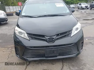 2018 Toyota Sienna L with VIN 5TDZZ3DC7JS912142, listed as a IAAI auction lot 42330428 with 221,498 mi miles and . Bid and sale history available at DreamBid. Image 6.