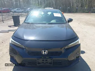2024 Honda Civic Sport z VIN 2HGFE2F58RH505580, wystawiony jako IAAI lot #41996669 z przebiegiem 17 450 mil mil oraz . Historia ofert i sprzedaży dostępna na DreamBid. Obrazek 12.