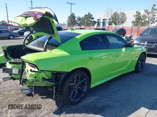 2023 Dodge Charger R/T with VIN 2C3CDXCT5PH584776, listed as a IAAI auction lot 41667014 with 14,730 mi miles and . Bid and sale history available at carsss.com. Image 4.