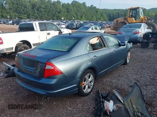 2012 Ford Fusion SE z VIN 3FAHP0HA7CR107455, wystawiony jako IAAI lot #39979687 z przebiegiem 157 764 mil mil oraz . Historia ofert i sprzedaży dostępna na DreamBid. Obrazek 4.