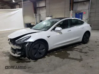 2019 Tesla Model 3 Mid Range with VIN 5YJ3E1EA3KF397147, listed as a Copart auction lot 86539124 with 59,437 mi miles and Salvage Title. Bid and sale history available at carsss.com. Image 1.