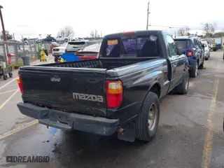 2003 Mazda B-Series 2WD Truck SX with VIN 4F4YR12D23TM09609, listed as a IAAI auction lot 41571323 with 194,860 mi miles. Bid and sale history available at carsss.com. Image 4.