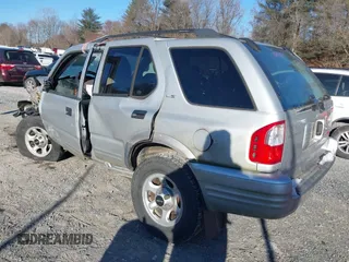 2001 Isuzu Rodeo S with VIN 4S2DM58W414351245, listed as a IAAI auction lot 41339632 with 149,543 mi miles and . Bid and sale history available at DreamBid. Image 3.