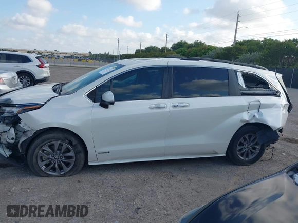 2021 Toyota Sienna XLE with VIN 5TDYRKEC7MS017968, listed as a IAAI auction lot 42145440 with 85,989 mi miles and . Bid and sale history available at DreamBid. Image 15.