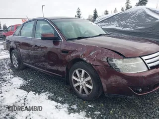 2009 Ford Taurus SEL with VIN 1FAHP24W39G113248, listed as a IAAI auction lot 41479030 with 159,196 mi miles. Bid and sale history available at carsss.com. Image 6.