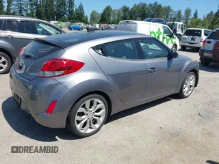 2012 Hyundai Veloster w/Black Int with VIN KMHTC6AD5CU030788, listed as a IAAI auction lot 42774337 with 104,297 mi miles and . Bid and sale history available at DreamBid. Image 4.
