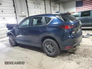 2020 Mazda CX-5 Touring z VIN JM3KFBCM5L1847751, wystawiony jako Copart lot #51189715 z przebiegiem 51 572 mil mil oraz Szkoda całkowita • Salvage title. Historia ofert i sprzedaży dostępna na DreamBid. Obrazek 2.
