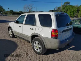 2002 Ford Escape XLT with VIN 1FMCU03112KC92704, listed as a IAAI auction lot 41807550 with 105,762 mi miles and . Bid and sale history available at DreamBid. Image 3.