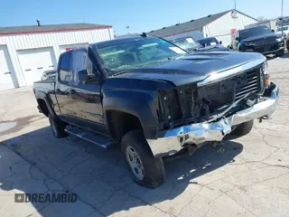 2018 Chevrolet Silverado 1500 LT with VIN 1GCVKREC7JZ252817, listed as a IAAI auction lot 38356875 with 60,094 mi miles and . Bid and sale history available at DreamBid. Image 1.