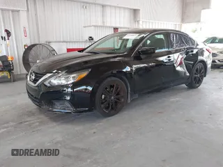 2017 Nissan Altima S z VIN 1N4AL3AP4HC251614, wystawiony jako IAAI lot #42250823 z przebiegiem 177 944 mil mil oraz . Historia ofert i sprzedaży dostępna na DreamBid. Obrazek 17.