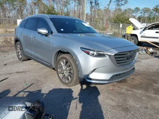 2017 Mazda CX-9 Grand Touring z VIN JM3TCADY5H0138176, wystawiony jako IAAI lot #41458610 z przebiegiem 114 664 mil mil oraz . Historia ofert i sprzedaży dostępna na DreamBid. Obrazek 1.