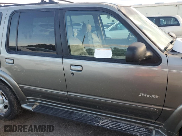 1999 Ford Explorer XLT z VIN 1FMZU34E3XZA39461, wystawiony jako Copart lot #74213774 z przebiegiem 119 937 mil mil oraz Szkoda całkowita • Salvage title. Historia ofert i sprzedaży dostępna na DreamBid. Obrazek 13.