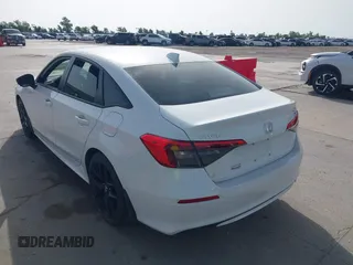 2023 Honda Civic Sport with VIN 2HGFE2F54PH521840, listed as a IAAI auction lot 42258323 with Not provided miles and . Bid and sale history available at DreamBid. Image 3.
