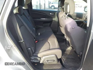 2013 Dodge Journey American Value with VIN 3C4PDCAB3DT610374, listed as a IAAI auction lot 40899147 with 133,386 mi miles and . Bid and sale history available at DreamBid. Image 8.