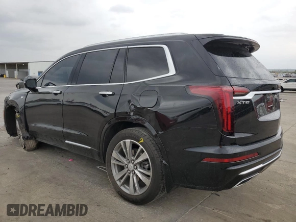 2021 Cadillac XT6 Premium Luxury z VIN 1GYKPERS0MZ181151, wystawiony jako Copart lot #78808104 z przebiegiem 31 697 mil mil oraz Szkoda całkowita • Salvage title. Historia ofert i sprzedaży dostępna na DreamBid. Obrazek 2.