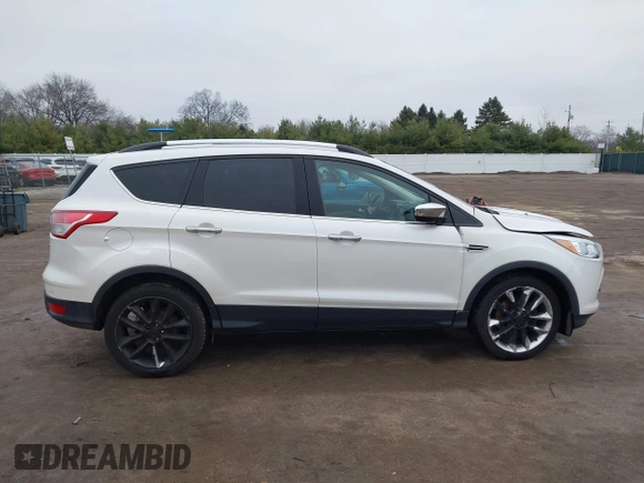 2016 Ford Escape SE z VIN 1FMCU9GX8GUA92661, wystawiony jako IAAI lot #41085877 z przebiegiem 76 632 mil mil oraz . Historia ofert i sprzedaży dostępna na DreamBid. Obrazek 13.