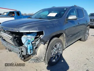 2022 GMC Acadia SLT with VIN 1GKKNMLS5NZ116462, listed as a IAAI auction lot 41195773 with 73,759 mi miles. Bid and sale history available at carsss.com. Image 2.
