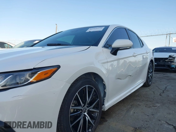 2023 Toyota Camry SE with VIN 4T1G11AK2PU799683, listed as a IAAI auction lot 41969271 with 32,332 mi miles and . Bid and sale history available at DreamBid. Image 6.