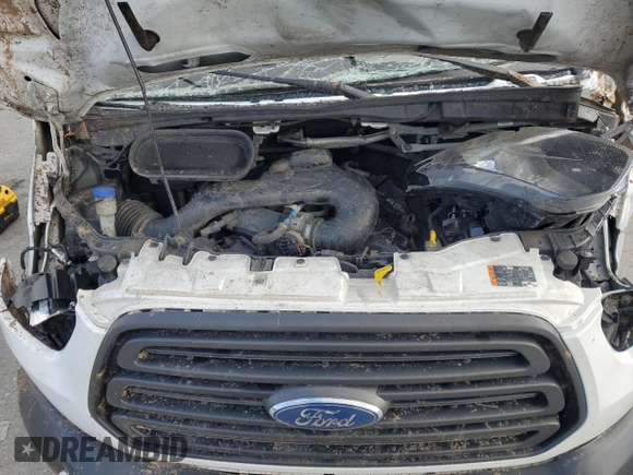 2019 Ford Transit with VIN 1FTYR2CM7KKB65988, listed as a Copart auction lot 56770645 with Not Provided miles and Salvage Title. Bid and sale history available at DreamBid. Image 12.