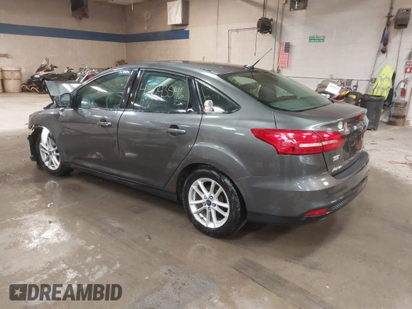 2016 Ford Focus SE with VIN 1FADP3F21GL247906, listed as a IAAI auction lot 42043546 with 124,532 mi miles and . Bid and sale history available at DreamBid. Image 3.