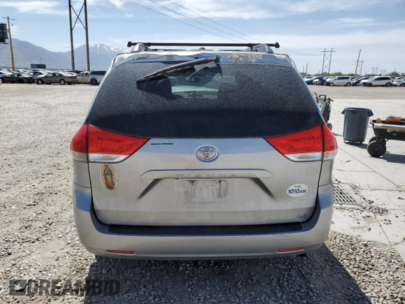 2011 Toyota Sienna LE AAS с VIN 5TDKK3DC9BS149113, выставлен на аукционе Copart как лот 56712085 с пробегом 212 294 миль миль и Списание • Salvage title. История ставок и продаж доступна на DreamBid. Изображение 6.