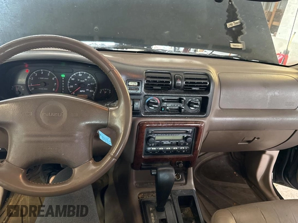 2002 Isuzu Rodeo S with VIN 4S2CK58W124336947, listed as a Copart auction lot 63482935 with 248,008 mi miles and Clean title. Bid and sale history available at DreamBid. Image 9.