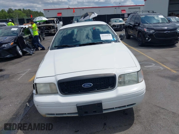 2006 Ford Police Interceptor z VIN 2FAHP71W26X166272, wystawiony jako IAAI lot #42144479 z przebiegiem 132 809 mil mil oraz . Historia ofert i sprzedaży dostępna na DreamBid. Obrazek 12.
