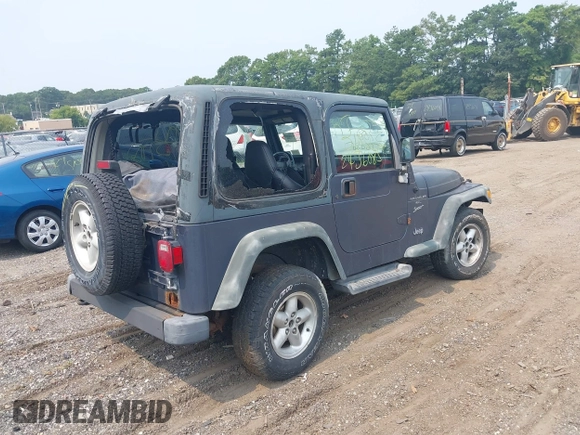 2001 Jeep Wrangler Sport with VIN 1J4FA49S91P330175, listed as a IAAI auction lot 40133432 with 999,999 mi miles. Bid and sale history available at carsss.com. Image 4.