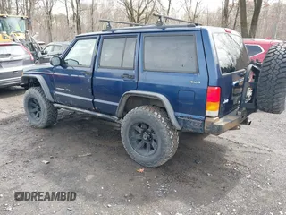 2000 Jeep Cherokee Classic with VIN 1J4FF58SXYL163514, listed as a IAAI auction lot 41920054 with 259,677 mi miles. Bid and sale history available at carsss.com. Image 3.