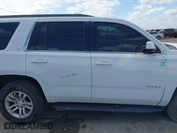2019 Chevrolet Tahoe LT with VIN 1GNSCBKC3KR160818, listed as a IAAI auction lot 41787468 with 174,691 mi miles and . Bid and sale history available at DreamBid. Image 13.