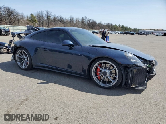 2015 Porsche 911 GT3 z VIN WP0AC2A93FS183671, wystawiony jako Copart lot #53236915 z przebiegiem 49 375 mil mil oraz Szkody całkowita. Historia ofert i sprzedaży dostępna na DreamBid. Obrazek 4.