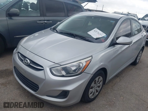 2015 Hyundai Accent GLS with VIN KMHCT4AE7FU930948, listed as a IAAI auction lot 42171213 with 150,543 mi miles and . Bid and sale history available at carsss.com. Image 2.