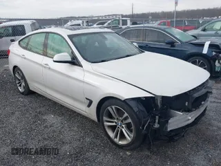 2016 BMW 3 Series GT 328i xDrive with VIN WBA8Z5C51GGS37544, listed as a IAAI auction lot 41474089 with 121,008 mi miles. Bid and sale history available at carsss.com. Image 1.