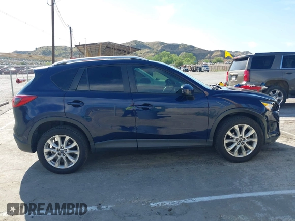 2014 Mazda CX-5 Grand Touring with VIN JM3KE2DY7E0376389, listed as a IAAI auction lot 42014946 with 126,081 mi miles. Bid and sale history available at carsss.com. Image 13.