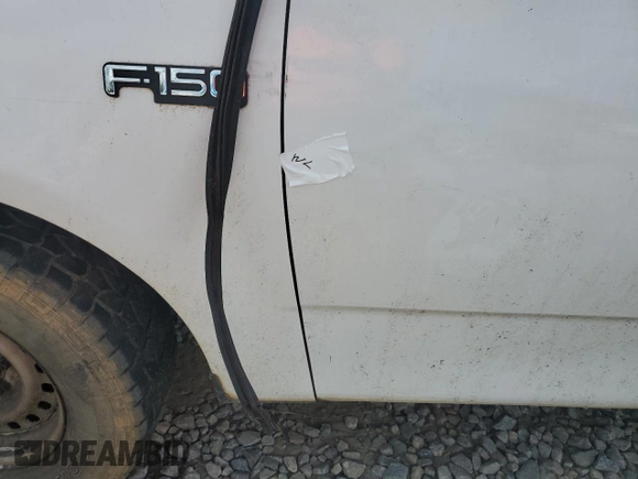 1997 Ford F-150 with VIN 1FTDF17W0VNC92212, listed as a Copart auction lot 74321454 with 242,523 mi miles and Salvage title. Bid and sale history available at DreamBid. Image 12.