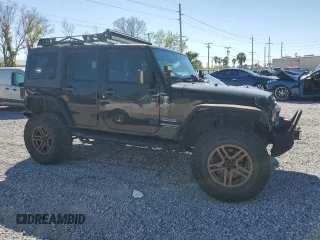 2014 Jeep Wrangler Unlimited Sport with VIN 1C4BJWDGXEL269693, listed as a Copart auction lot 46927895 with 105,691 mi miles and Salvage Title. Bid and sale history available at carsss.com. Image 4.
