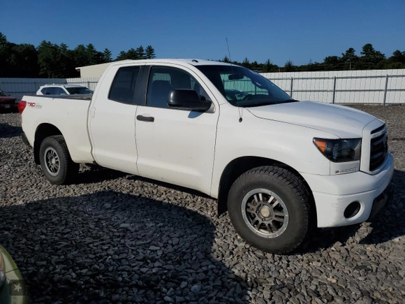 2010 Toyota Tundra 4WD Truck with VIN 5TFUY5F10AX128464, listed as a Copart auction lot 70081574 with 229,736 mi miles and Clean Title. Bid and sale history available at carsss.com. Image 4.