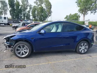 2023 Tesla Model Y Long Range z VIN 7SAYGDEE5PA102285, wystawiony jako IAAI lot #42402981 z przebiegiem 24 550 mil mil oraz . Historia ofert i sprzedaży dostępna na DreamBid. Obrazek 15.