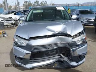 2016 Mitsubishi Outlander Sport 2.0 ES with VIN JA4AP3AUXGZ049077, listed as a IAAI auction lot 41679521 with 93,027 mi miles. Bid and sale history available at carsss.com. Image 12.