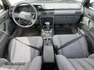 1990 Toyota Camry z VIN JT2VV21E2L0114723, wystawiony jako Copart lot #53584755 z przebiegiem 58 986 mil mil oraz Czysty tytuł • Clean title. Historia ofert i sprzedaży dostępna na DreamBid. Obrazek 8.