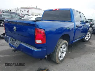2015 Ram 1500 Express z VIN 1C6RR6KG0FS762887, wystawiony jako IAAI lot #42047359 z przebiegiem 146 963 mil mil oraz . Historia ofert i sprzedaży dostępna na DreamBid. Obrazek 4.