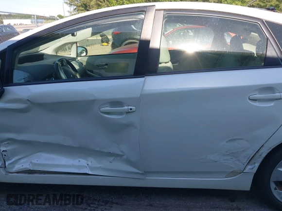 2013 Toyota Prius One with VIN JTDKN3DU3D0348163, listed as a IAAI auction lot 42115180 with 121,397 mi miles and . Bid and sale history available at DreamBid. Image 14.