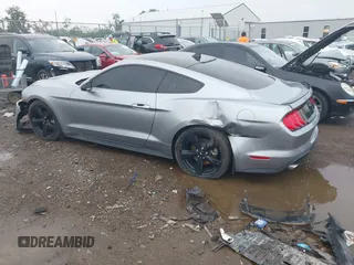 2023 Ford Mustang EcoBoost with VIN 1FA6P8TH9P5105743, listed as a IAAI auction lot 42525135 with 31,116 mi miles and . Bid and sale history available at DreamBid. Image 3.