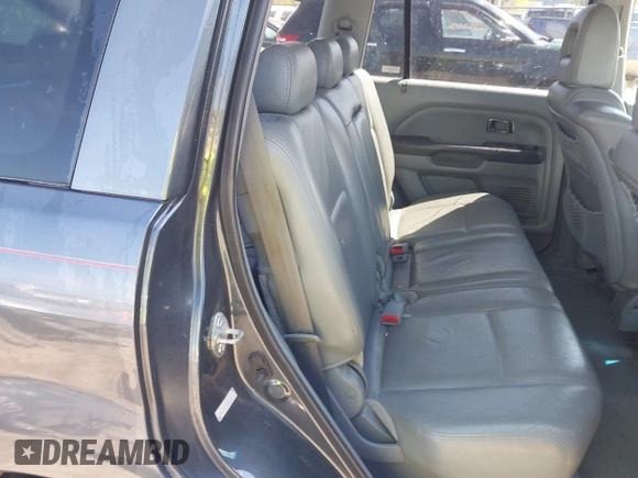2005 Honda Pilot EX-L with VIN 2HKYF18625H515771, listed as a IAAI auction lot 42152527 with 293,380 mi miles and . Bid and sale history available at DreamBid. Image 8.