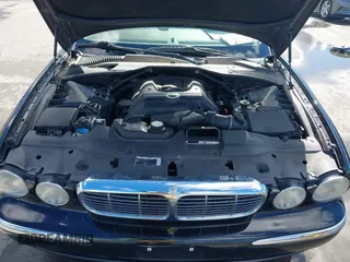 2004 Jaguar XJ with VIN SAJEA74C94SG11224, listed as a IAAI auction lot 41732975 with 204,815 mi miles and . Bid and sale history available at DreamBid. Image 10.